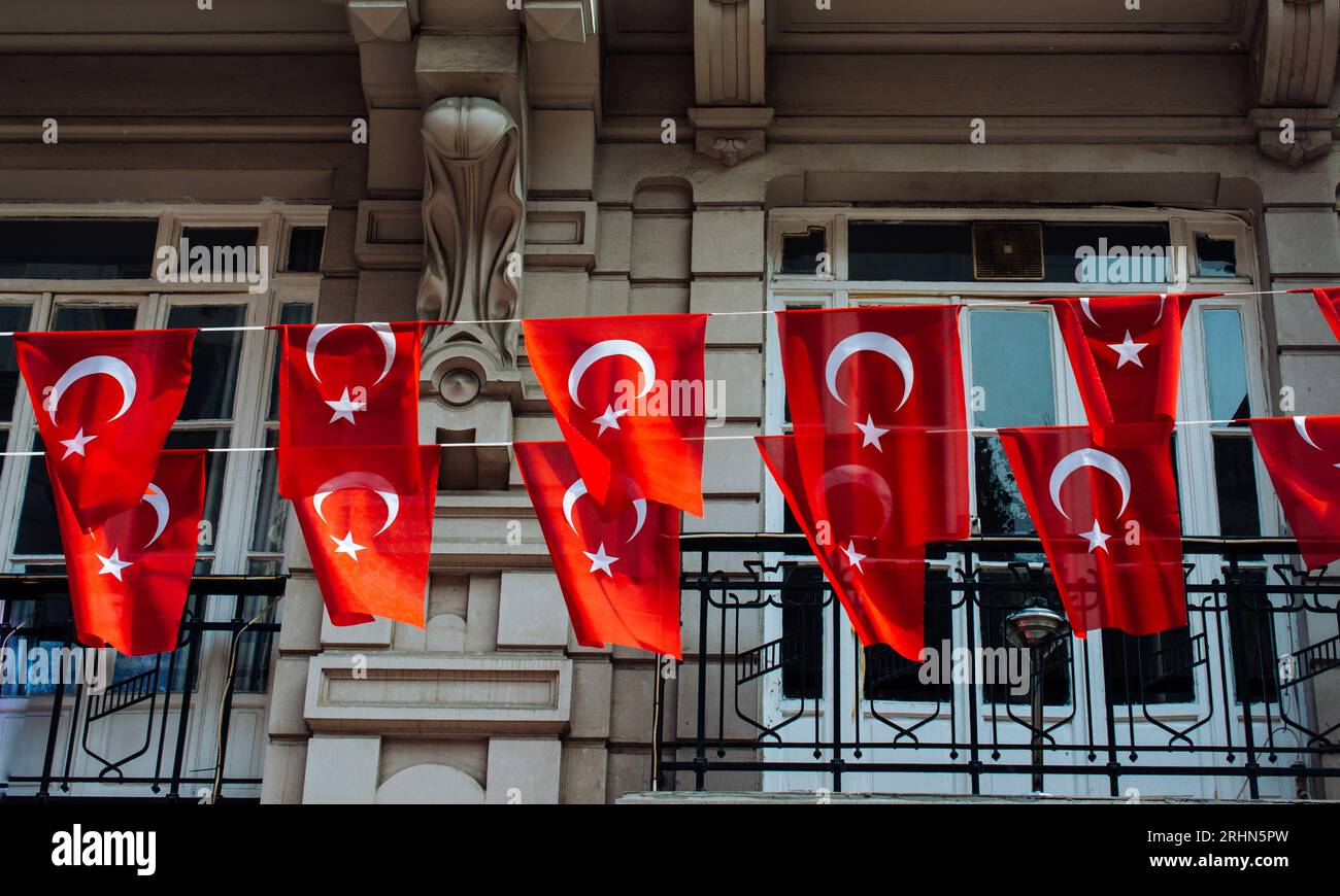 Turkish national flags with white star and moon in sky Stock Photo