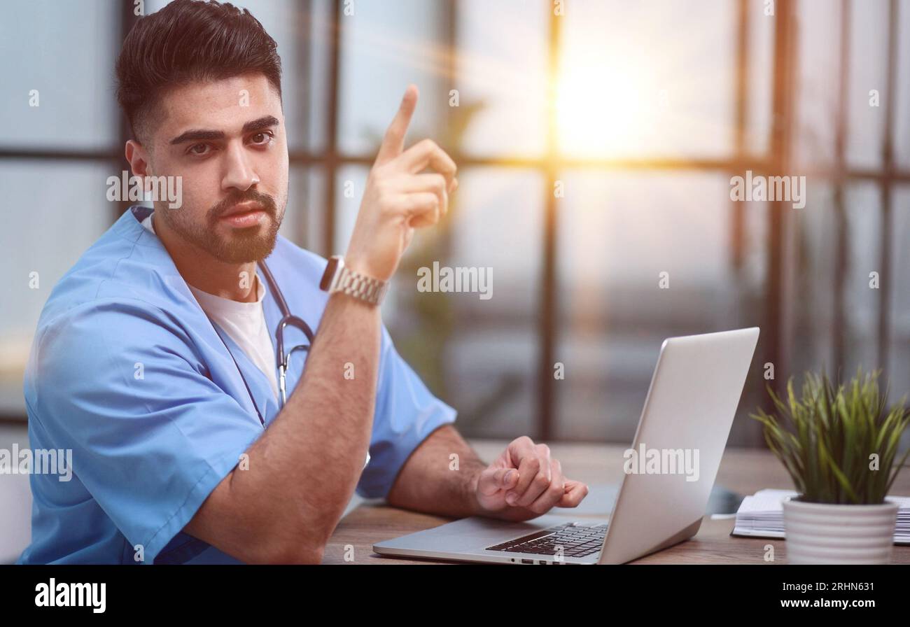 Serious professional general practitioner looking at the camera Stock Photo