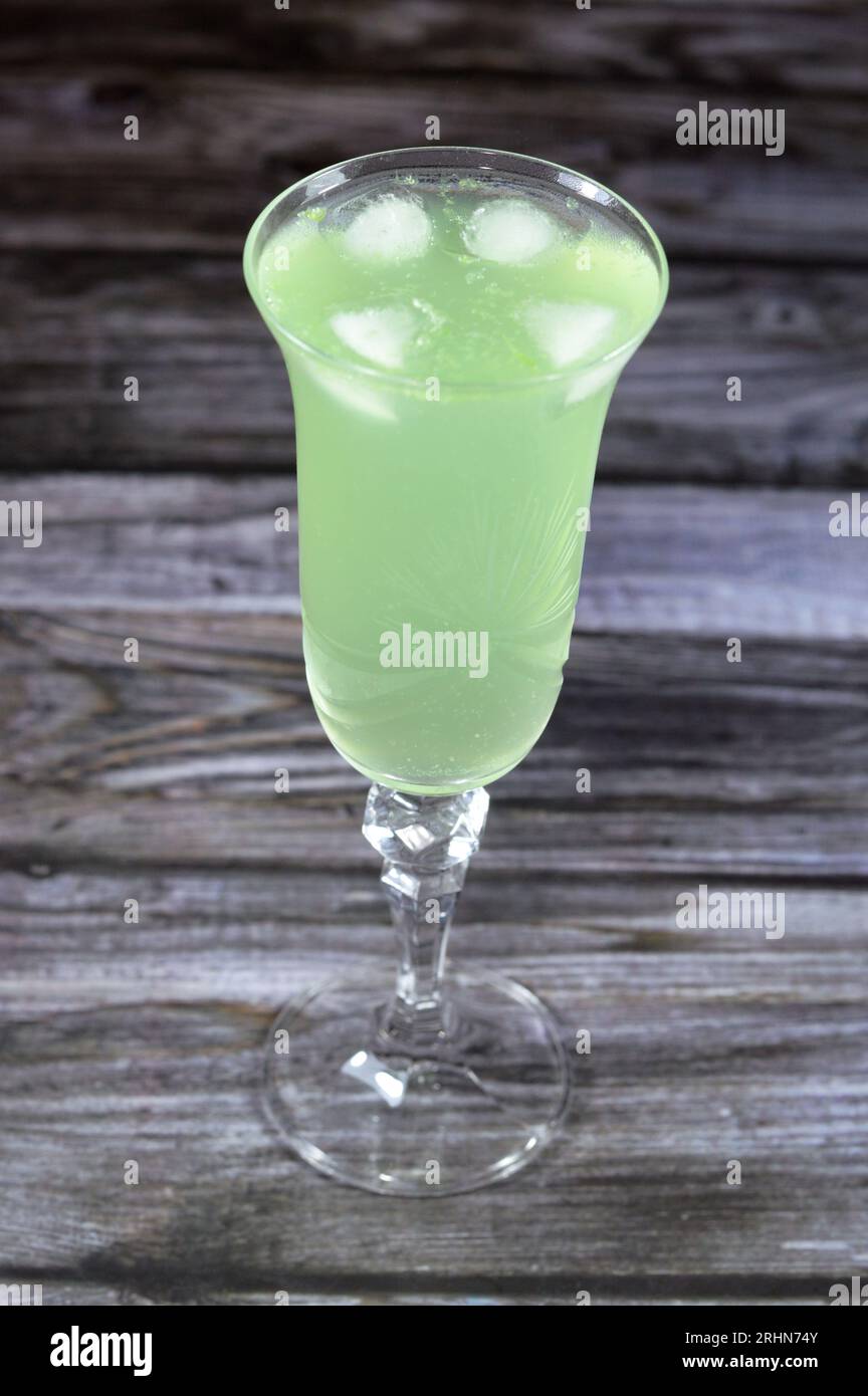 Lemon mint soft drink with ice, green pop soda, carbonated lemonade