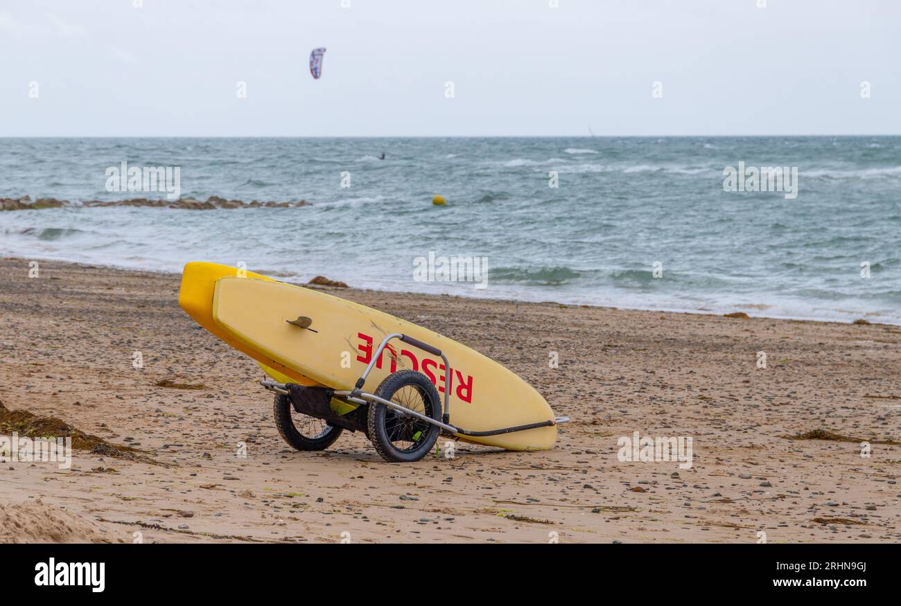 rescue board on a beach from lifeguard Stock Photo