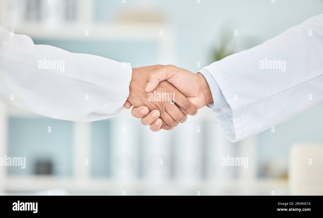 Handshake, partnership and people in healthcare with trust and help ...