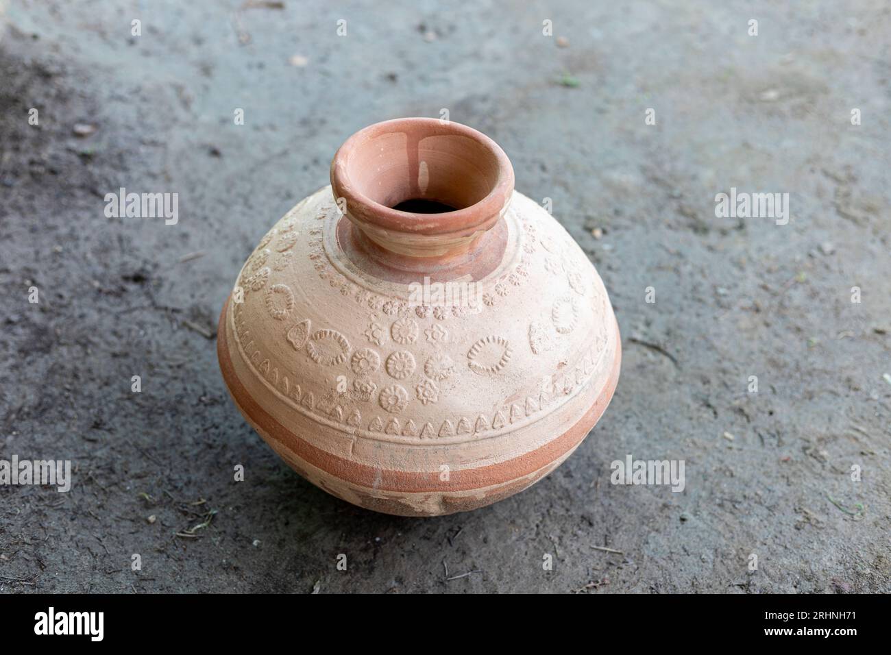 https://c8.alamy.com/comp/2RHNH71/handmade-clay-water-pot-closeup-selective-focus-2RHNH71.jpg