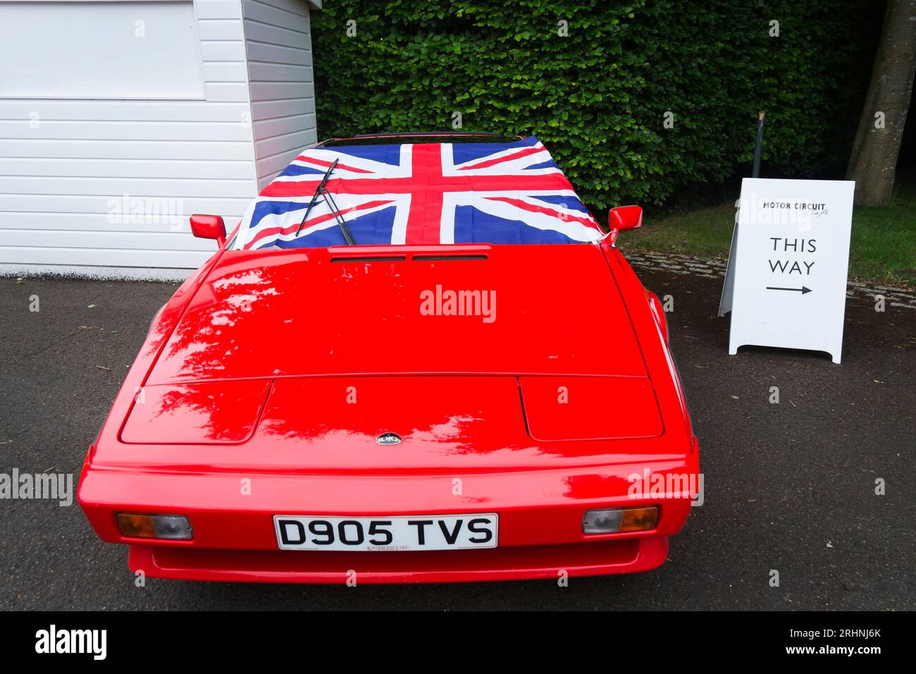 A red 1970s Lotus Esprit with Union Jack flag at Rule Britannia