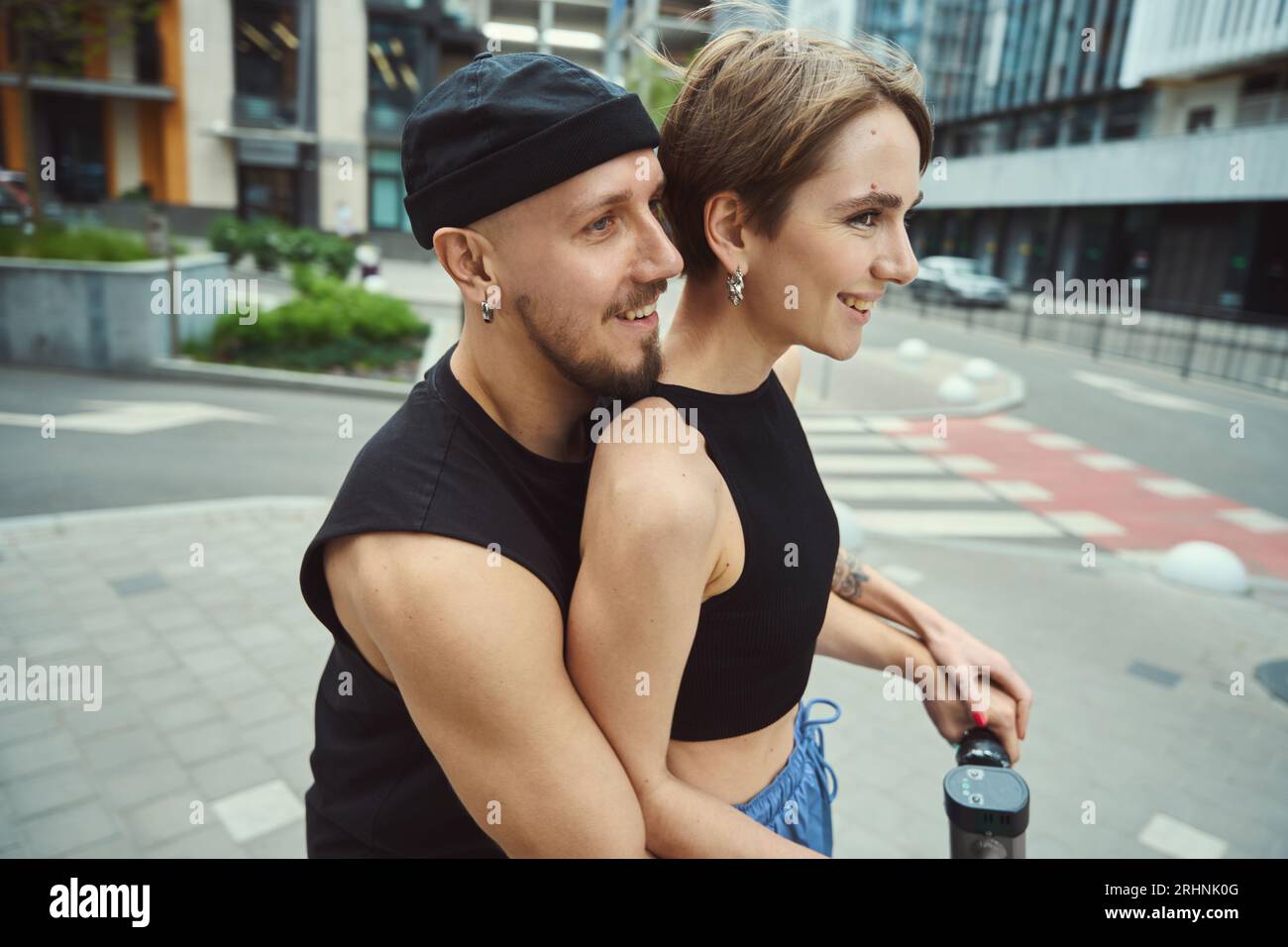 Gf Ride Artist Cheerful young couple rides scooter hi-res stock photography and images ...