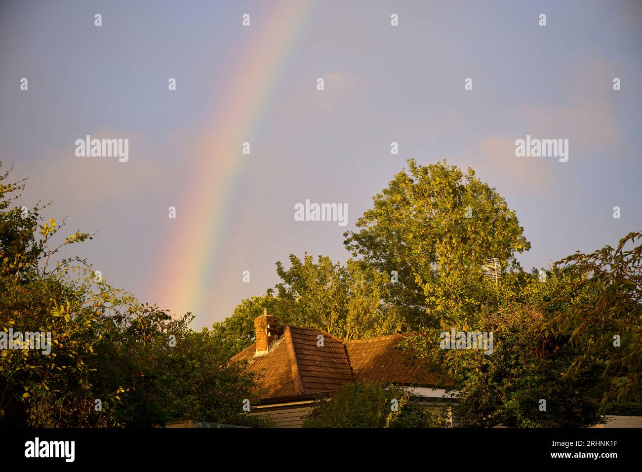 A Rainbow after passing rain Stock Photo - Alamy