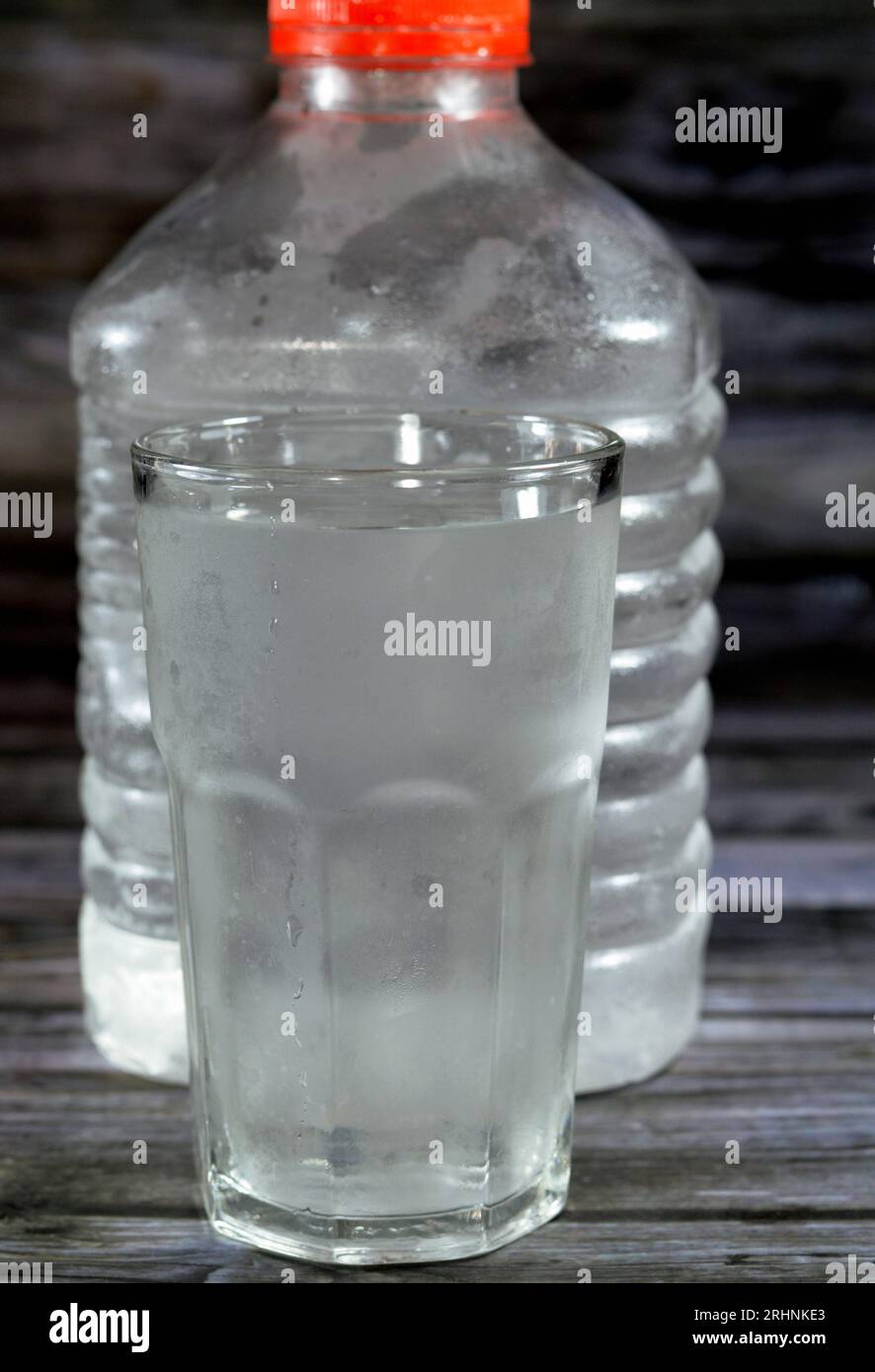 Pure fresh refrigerated cold water for drinking, Water is an inorganic compound with the chemical formula H2O, a transparent, tasteless, odorless and Stock Photo