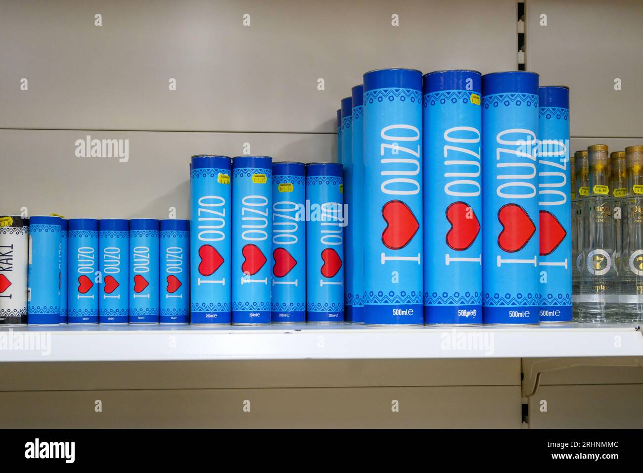 Kos, Greece May 7, 2023 Greek Ouzo bottles at the market store. Ouzo