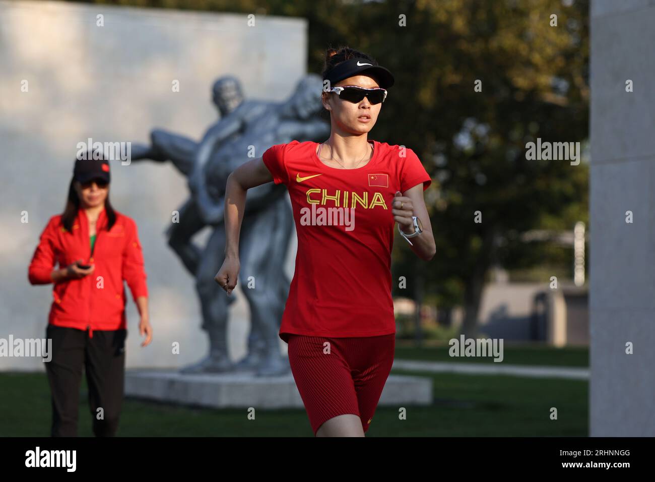 Budapest. 18th Aug, 2023. Racewalking athlete Yang Jiayu (R) of China