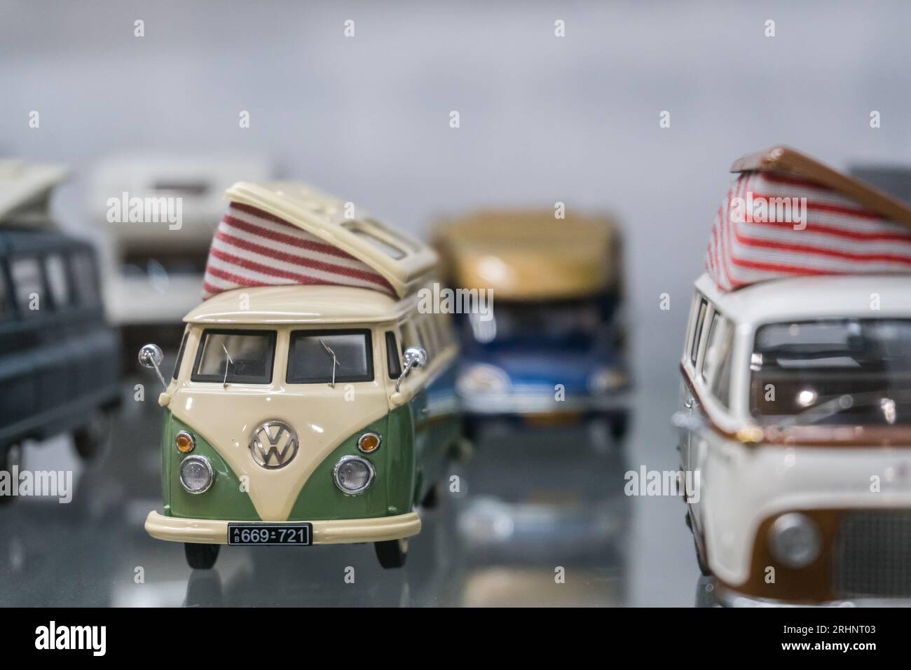Toy or model  Volkswagen vans with pop-up tops for camping on display. Stock Photo