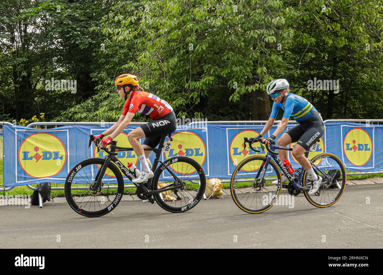 Marte Berg Edseth of Norway and Julia Borgstrom of Sweden racing through Kelvingrove Park, Glasgow during a city lap: UCI Cycling World Championships. Stock Photo