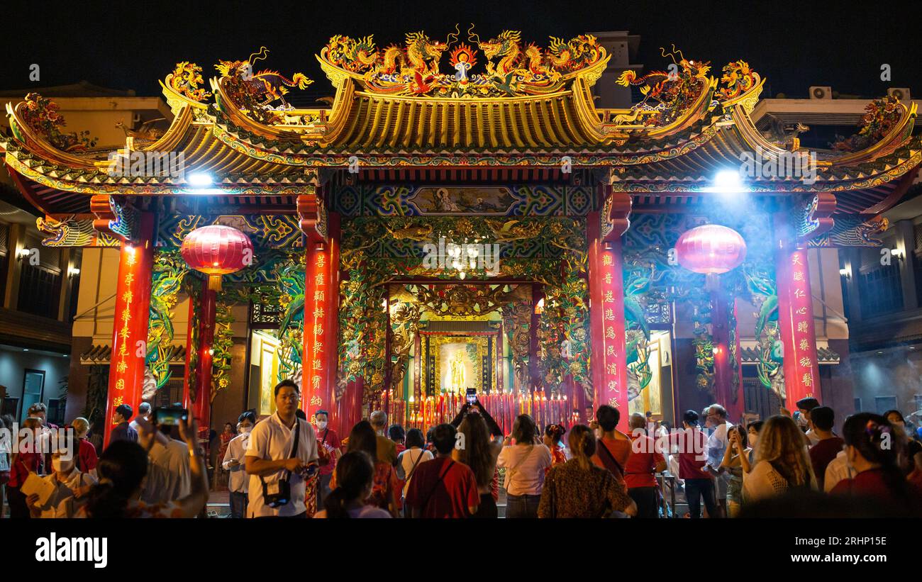 Bangkok, Thailand - January 22, 2023: People at Kuan Yim shrine in Bangkok, Thailand. Stock Photo