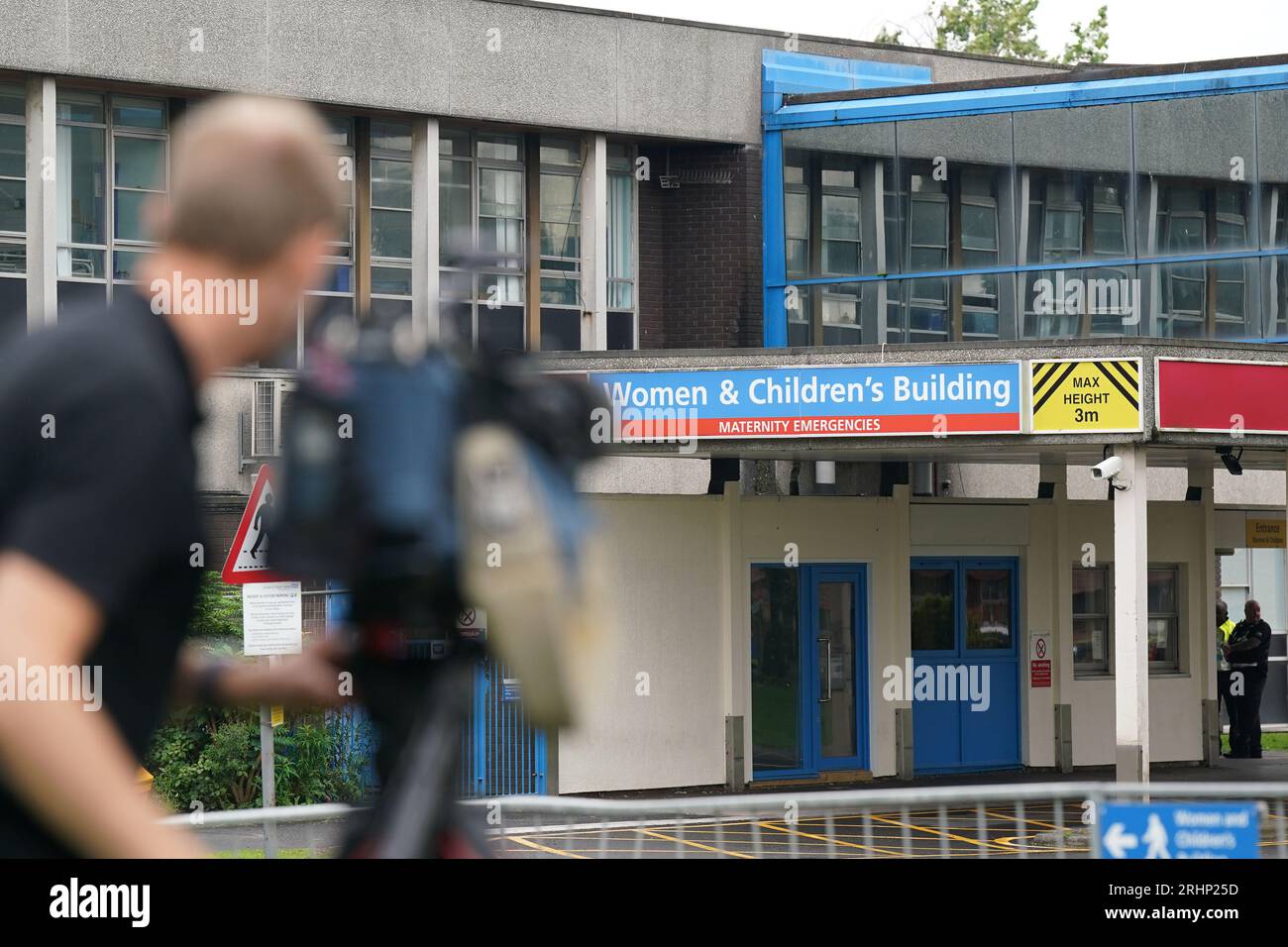 Members of the media outside the Countess of Chester Hospital after nurse Lucy Letby, 33, was found guilty at Manchester Crown Court of the murders of seven babies and the attempted murders of six others at the hospital. Letby was accused of the murder of seven babies and the attempted murder of another ten, between June 2015 and June 2016 while working on the neonatal unit of the hospital. Picture date: Friday August 18, 2023. Stock Photo