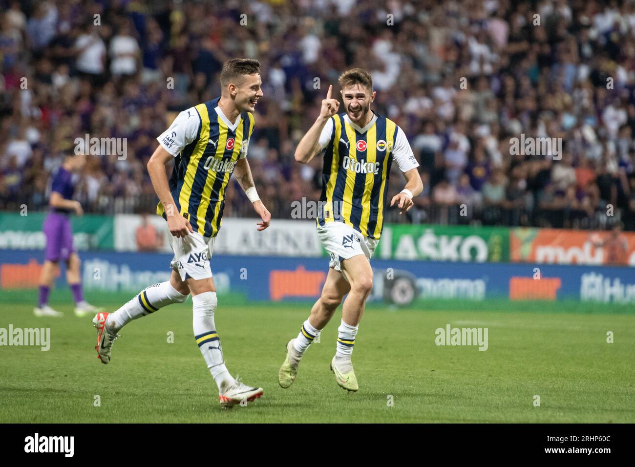 Maribor, Slovenia. 17th Aug, 2023. Sebastian Szymanski (L) and Ismail Yuksek (R) celebrate after scoring a goal during the UEFA Europa Conference League 3rd qualifying round second leg match between Maribor and Fenerbahce at Ljudski Vrt Stadium. Final score; Maribor 0:3 Fenerbahce. (Photo by Milos Vujinovic/SOPA Images/Sipa USA) Credit: Sipa USA/Alamy Live News Stock Photo