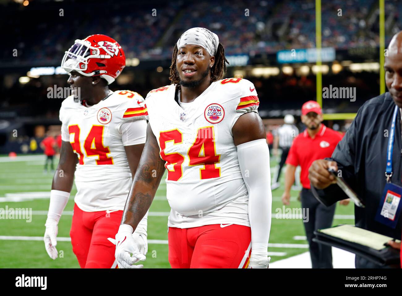 Kansas City Chiefs offensive tackle Wanya Morris (64) warms up
