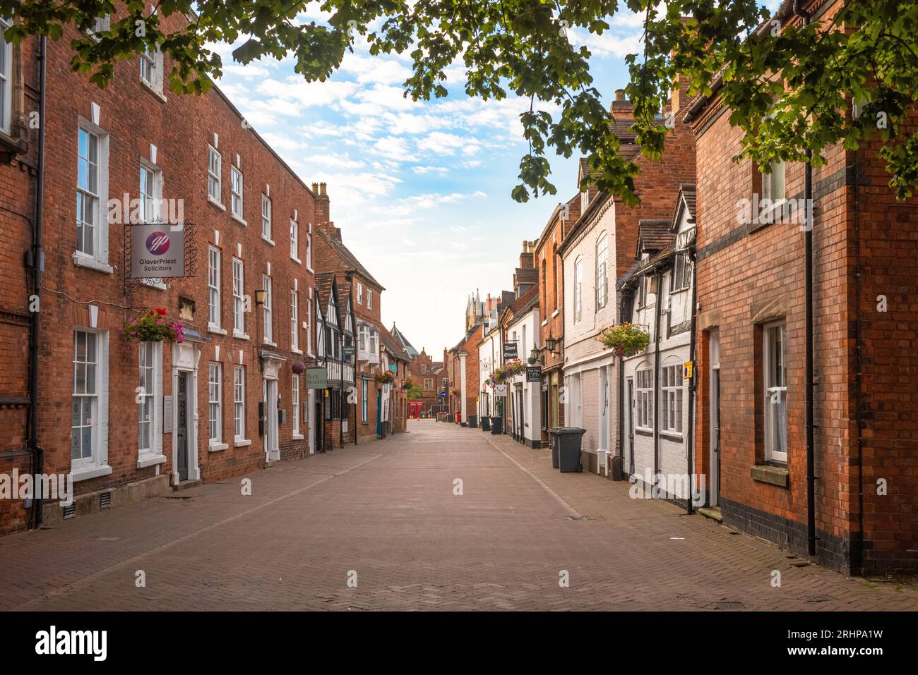 A view looking south east down Dam Street towards the market square in the early morning in the historic and picturesque city of Lichfield in Stafford Stock Photo