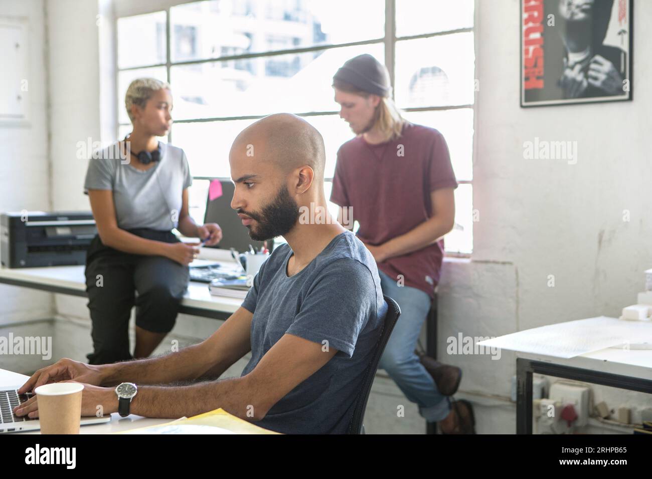Young people in work situation Stock Photo