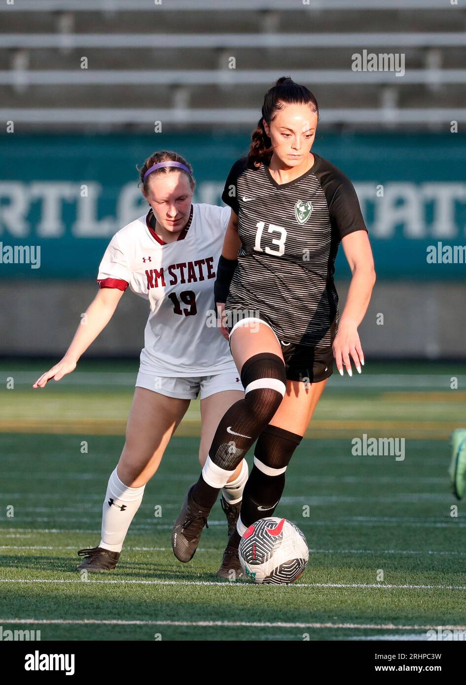 August 17, 2023: Portland State forward Riley Larsen (13) races past New Mexico State midfielder Tati Jerman (19) during the NCAA women's soccer game between the Portland State Vikings and the New Mexico State Aggies at Hillsboro Stadium, Hillsboro, OR. Larry C. Lawson/CSM (Credit Image: © Larry C. Lawson/Cal Sport Media) Stock Photo
