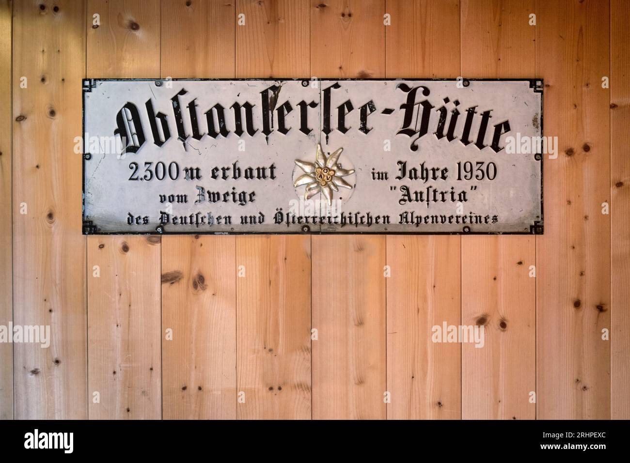 Austria, East Tyrol, district of Lienz, Kartitsch. Inside the hut Obstansersee Hütte the old plaque of the Austrian Alpine Club Stock Photo