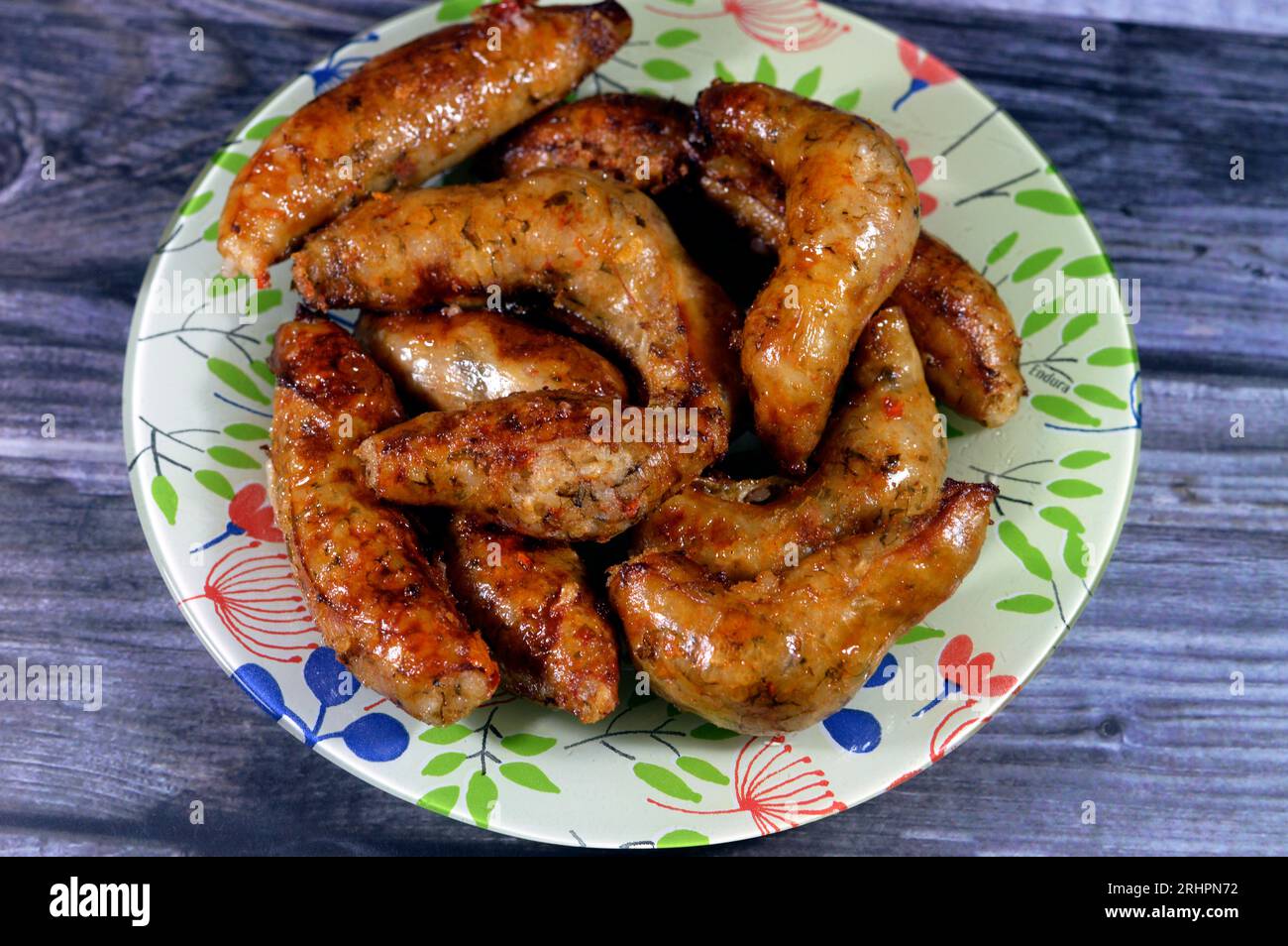 Egyptian classic homemade sausage of deep fried stuffed mumbar which is basically intestines that are filled with spicy rice, herbs, onion, and tomato Stock Photo