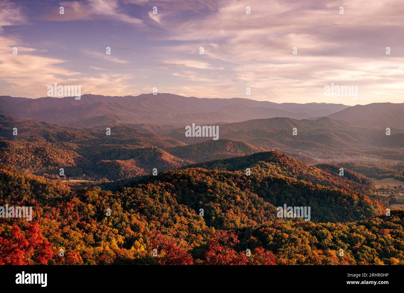 Late afternoon vista from the Foothills Parkway viewed across Townsend.  The tallest mountain in the distance is Thunderhead Mountain in Great Smoky M Stock Photo