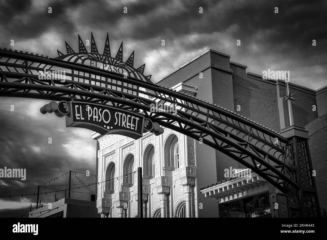 A gate and sign over El Paso Street in the downtown area of El Paso