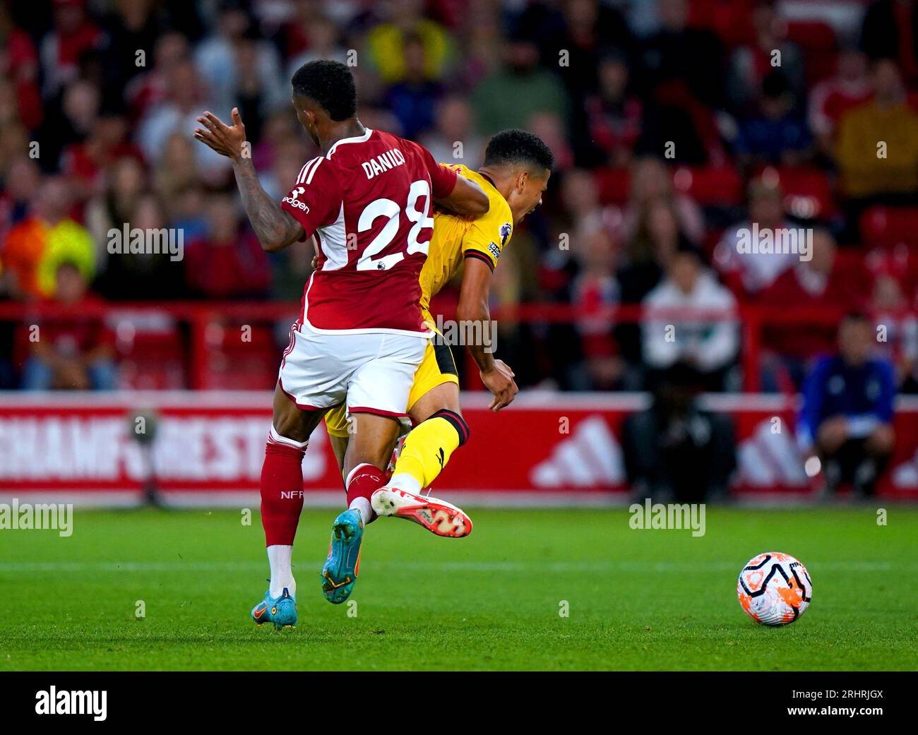 Nottingham Forest's Danilo (left) collides with Sheffield United's William Osula as they battle for the ball during the Premier League match at the City Ground, Nottingham. Picture date: Friday August 18, 2023. Stock Photo