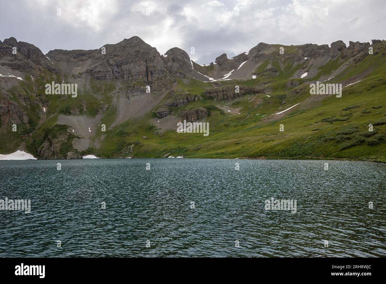 Beautiful mountain view with a clear, blue lake. Beautiful blue sky ...
