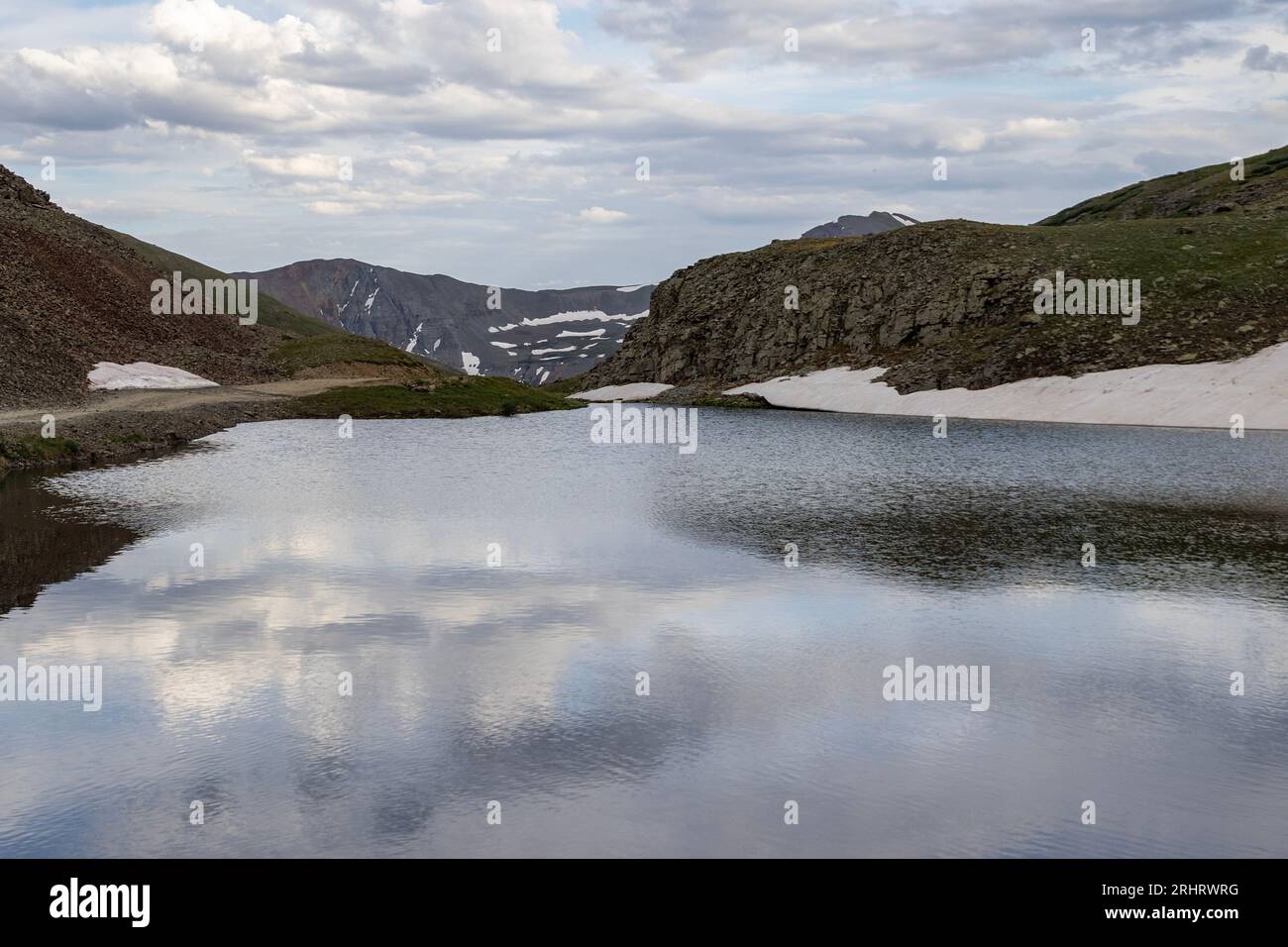 Beautiful mountain view with a clear, blue lake. Beautiful blue sky ...
