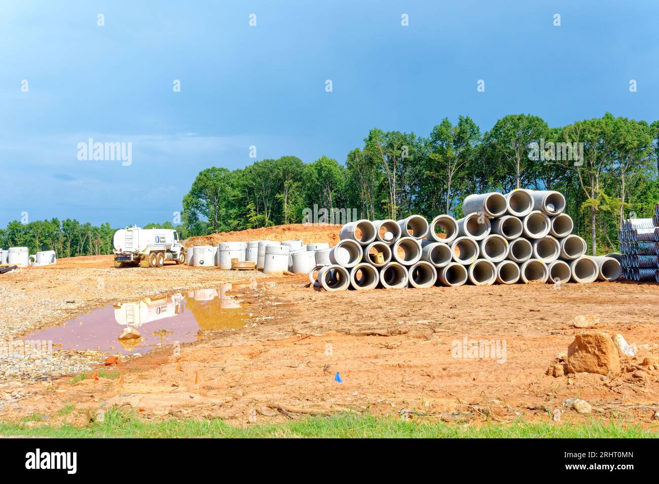 Concrete sewer pipes at a residential construction site Stock Photo Alamy