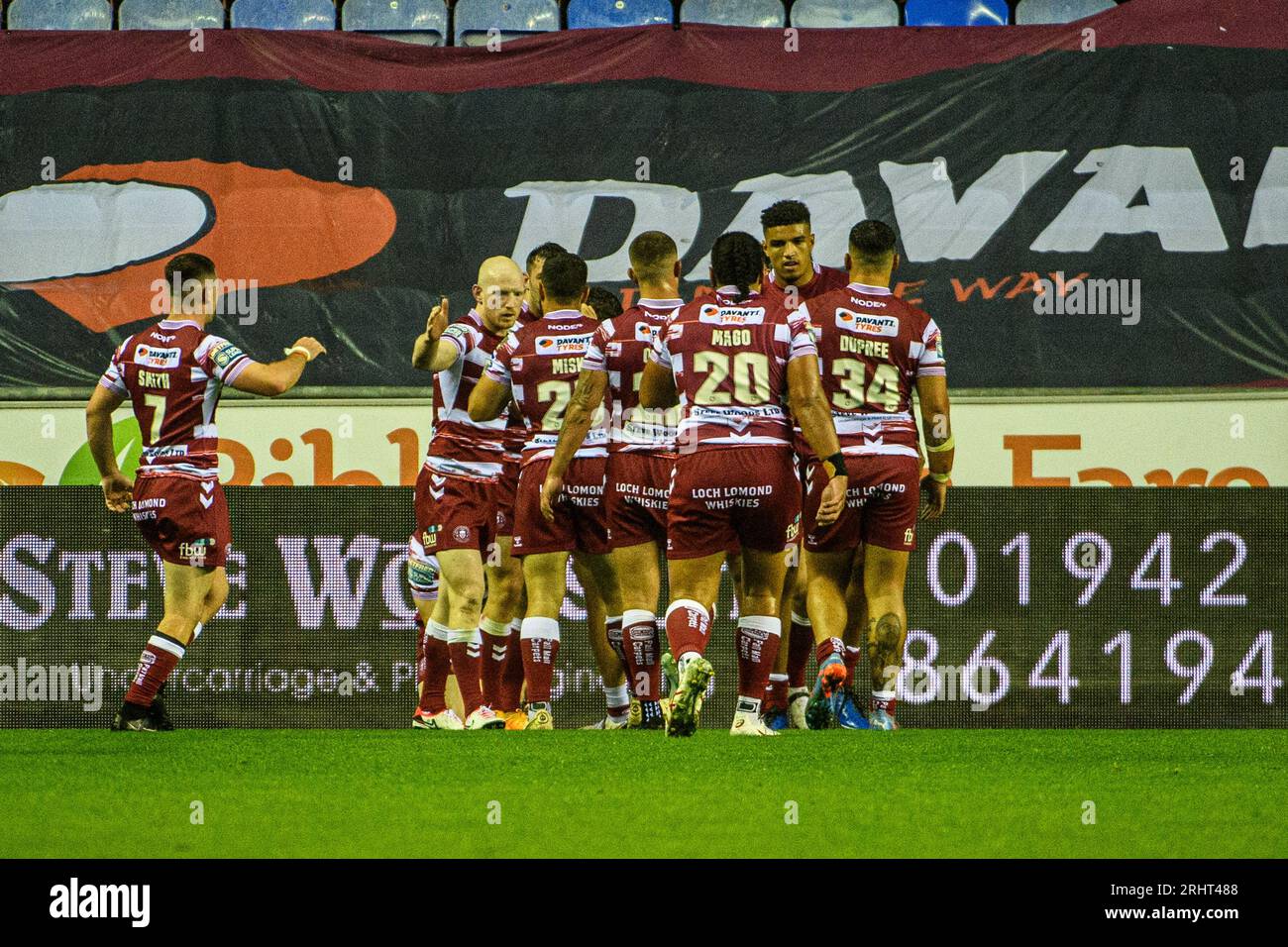 Wigan Warriors celebrate their first try during the BetFred Super League match between Wigan Warriors and Hull Football Club at the DW Stadium, Wigan on Friday 18th August 2023