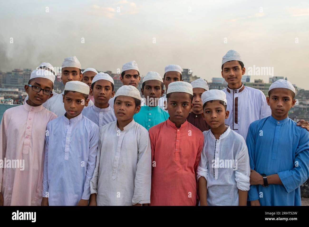 A group of students on the roof top of a madrasha (islamic school) in old Dhaka, Bangladesh Stock Photo