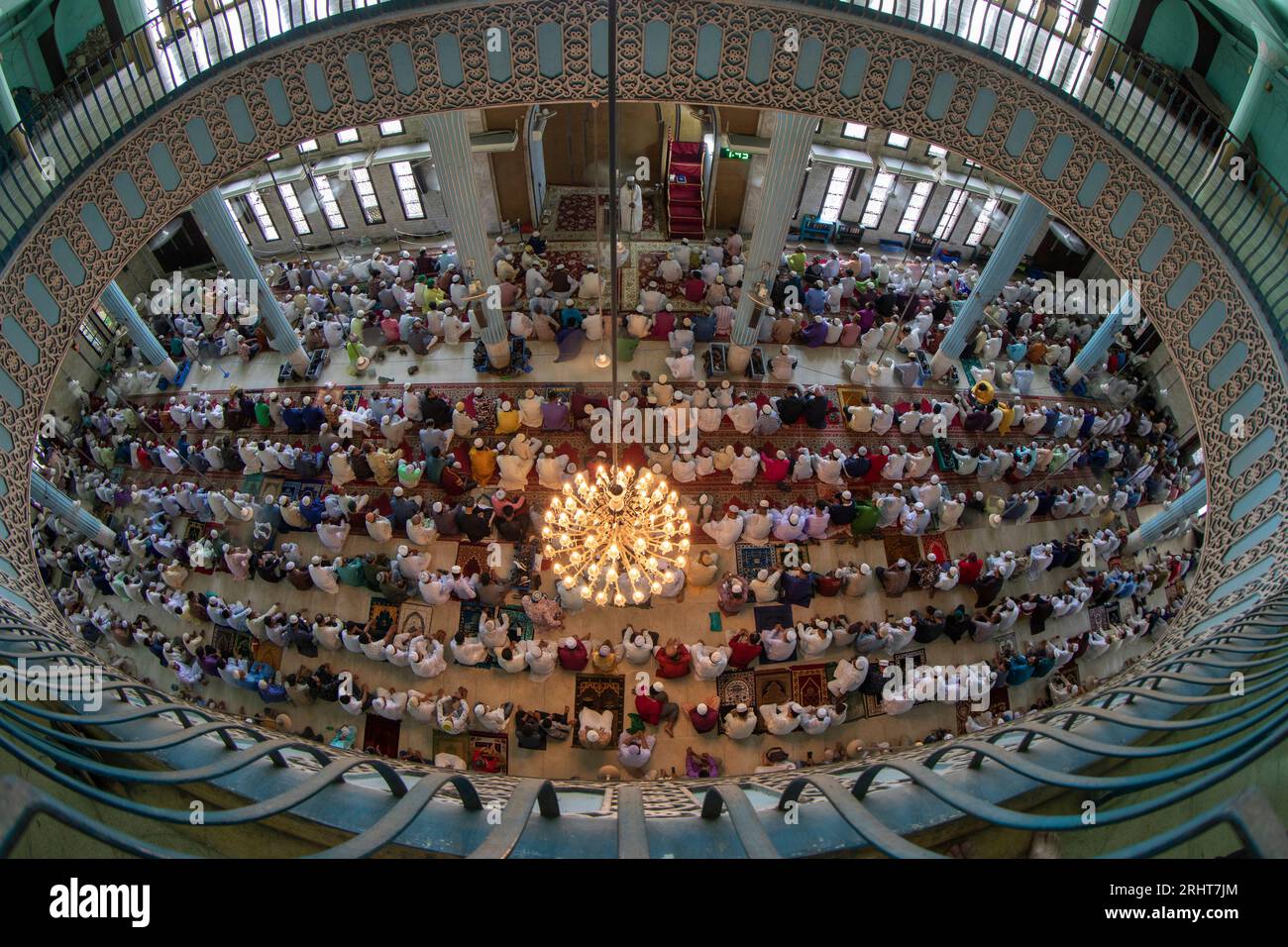 Muslims offer Eid–ul-Azha prayers at the Baitul Mukarram National Mosque in Dhaka, Bangladesh. Stock Photo