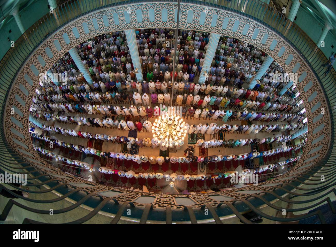 Muslims offer Eid–ul-Azha prayers at the Baitul Mukarram National Mosque in Dhaka, Bangladesh. Stock Photo