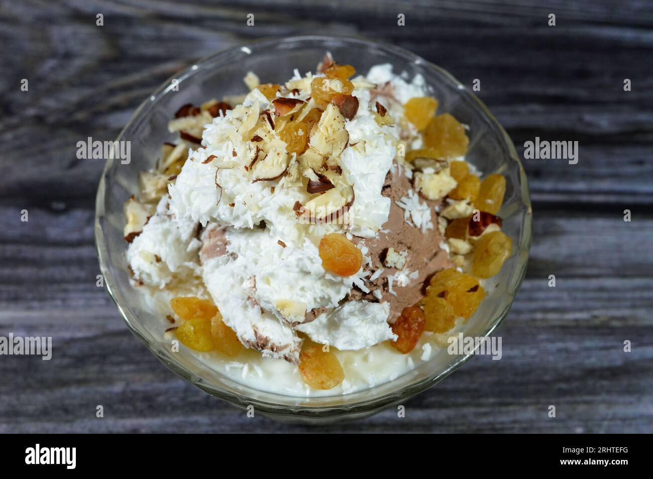 Rice pudding, rice, corn flour, sugar, milk topped with whipped cream
