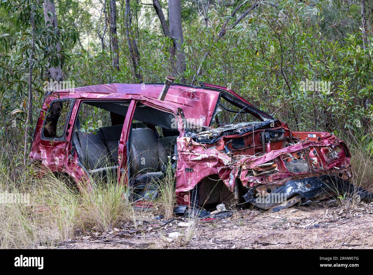 Dumped motor vehicle in bushland Sydney Australia Stock Photo