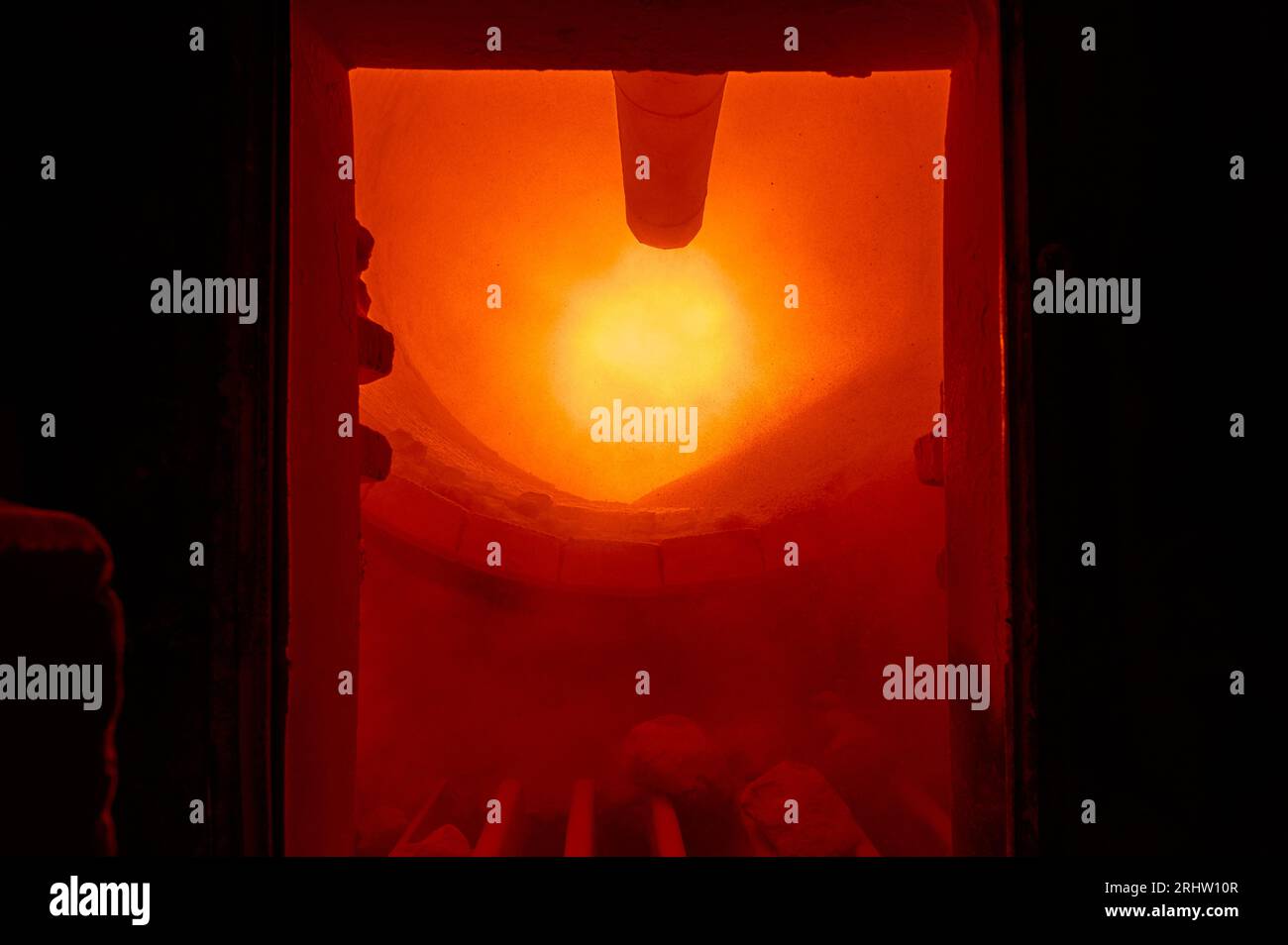 Rotating furnace for limestone roasting at industrial plant Stock Photo