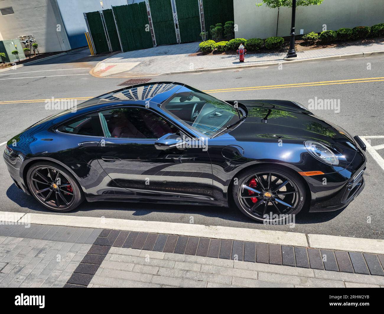 New York City, USA - May 10, 2023: Porsche 911 2021 sport car, side view. Stock Photo
