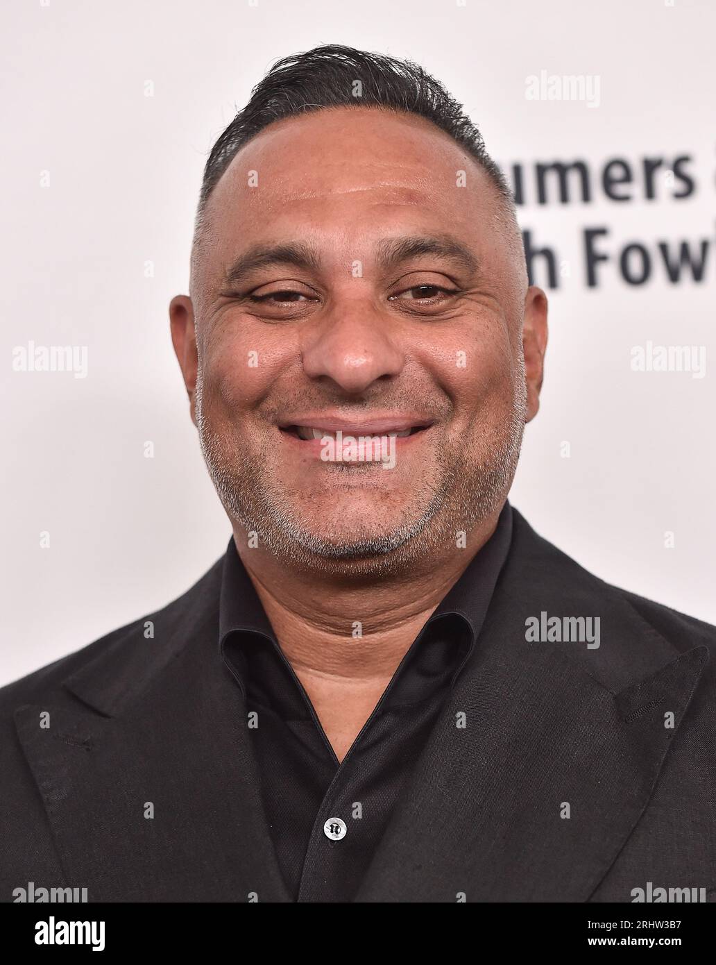 Beverly Hills, USA. 18th Aug, 2023. Russell Peters arriving to the 23rd Annual Harold & Carole Pump Foundation Gala at Beverly Hilton Hotel on August 18, 2023 in Beverly Hills, CA. © Lisa OConnor/AFF-USA.com Credit: AFF/Alamy Live News Stock Photo