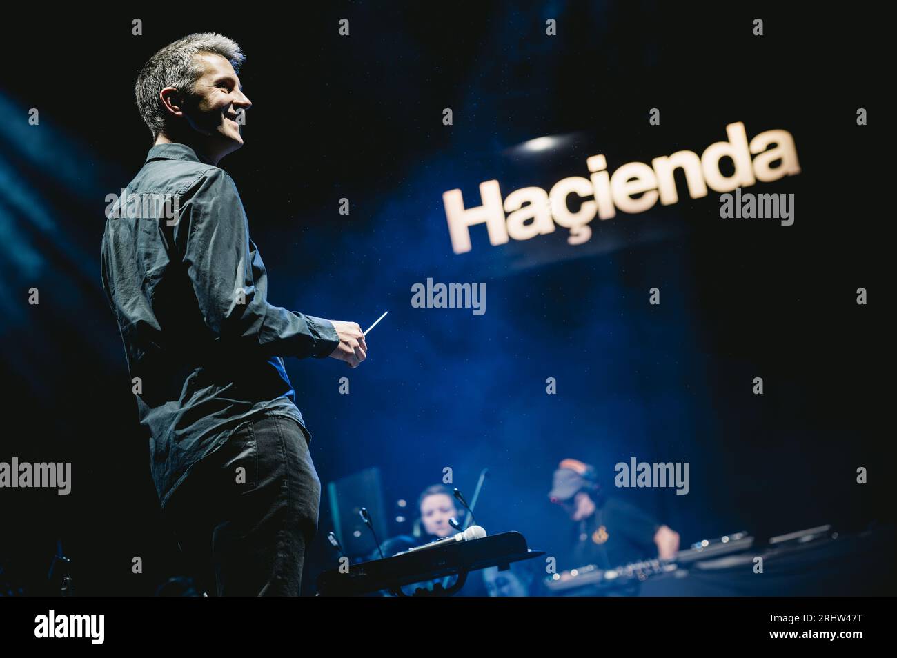 Sedgefield, UK. 18th Aug, 2023. Hacienda Classical, featuring Graeme Park, Manchester Camerata and Peter Hook perform at Hardwick Festival. Credit: Thomas Jackson/Alamy Live News Stock Photo