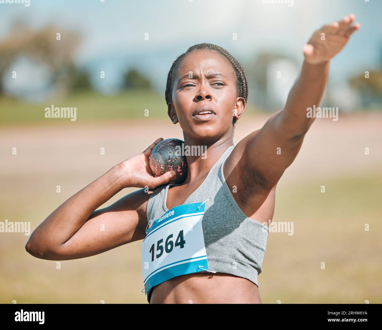 Shot put, athlete and woman in throw competition, championship or