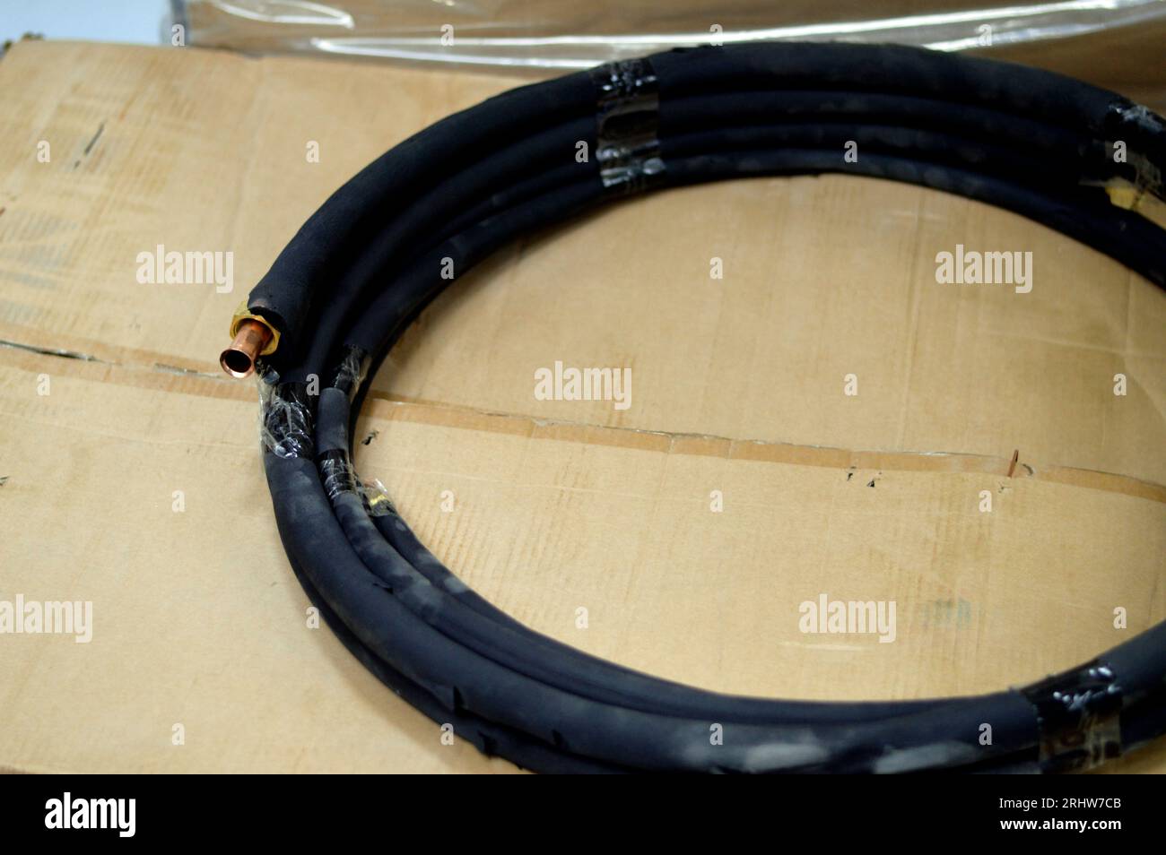 Air conditioning copper pipes tubes covered with black rubber, copper