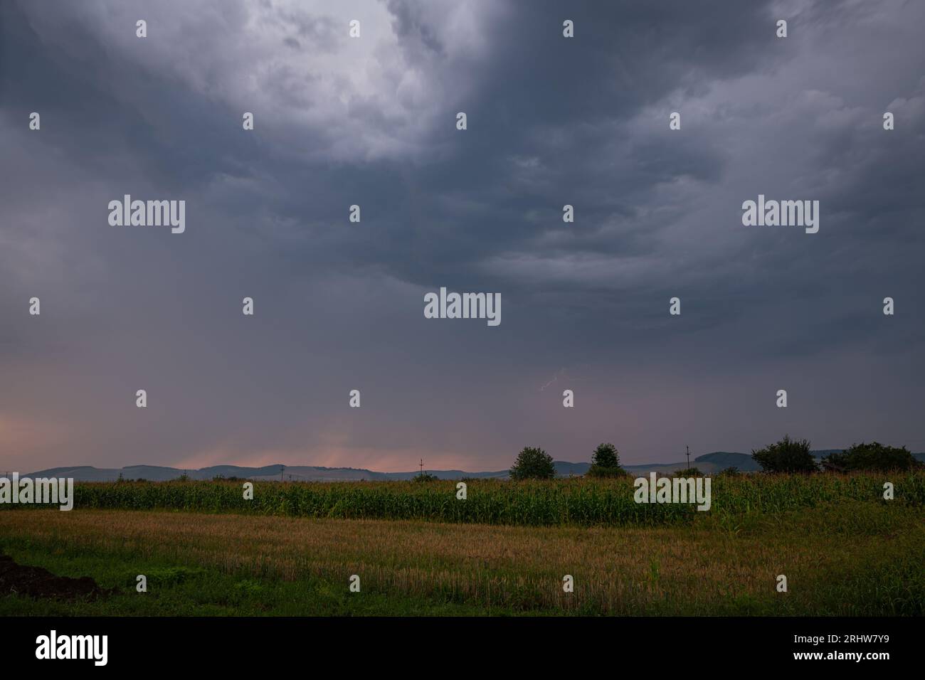 Early morning storm clouds moving over the countryside in Transylvania, Romania. Stock Photo