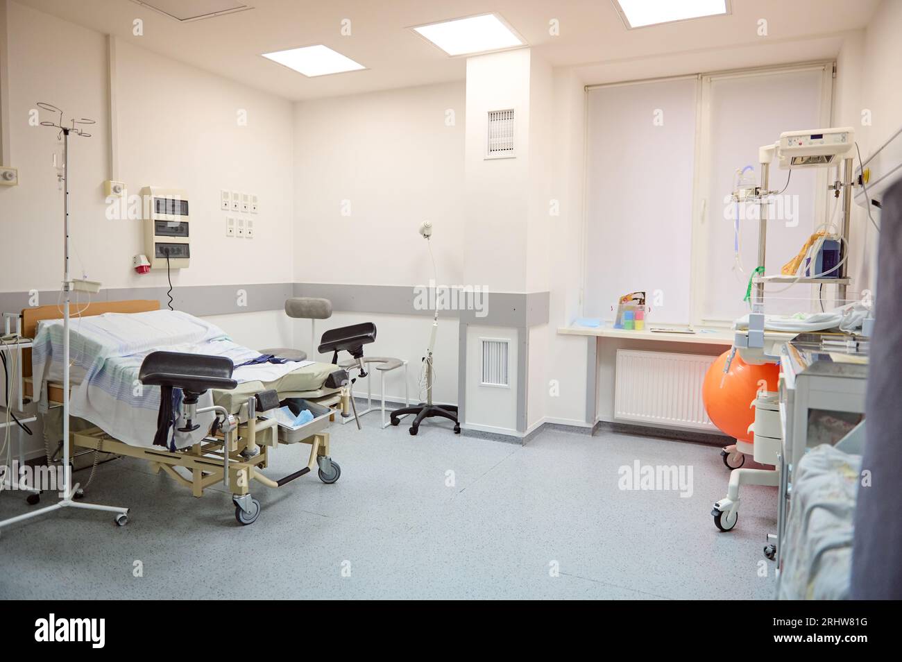 Interior of an empty hospital ward in a modern maternity clinic. Childbirth. Delivery. Labor concept. Pregnancy and maternity concept. Obstetrics and Stock Photo