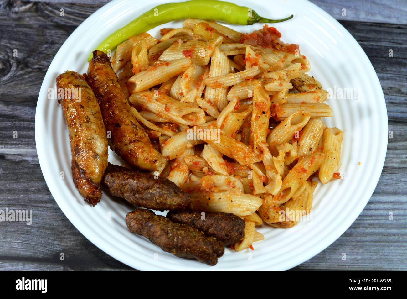 A plate of classic pasta penne macaroni with tomato sauce, Egyptian
