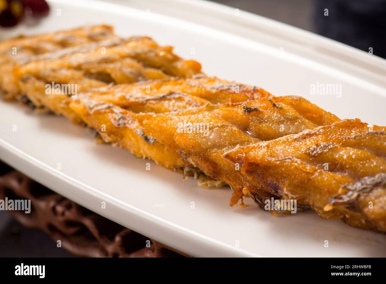 Fried beltfish (largehead hairtail), daiyu, Chinese food close up.grilled ribbon fish Stock