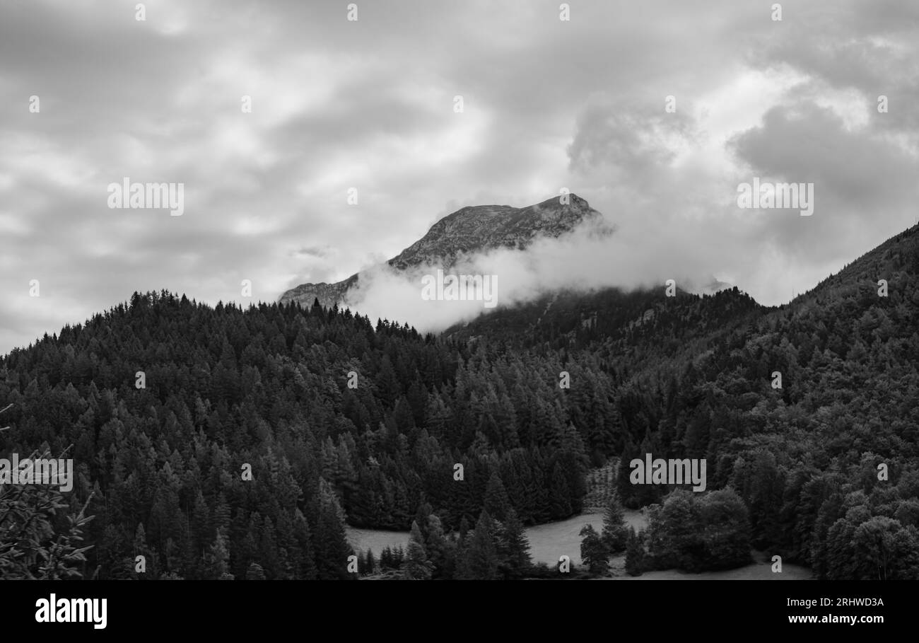 Alps mountains in stormy clouds, in black and white Stock Photo - Alamy