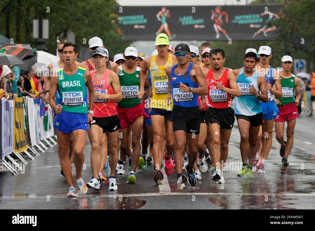 Caio Bonfim, of Brazil, left, Brian Daniel Pintado, of Ecuador, centre ...
