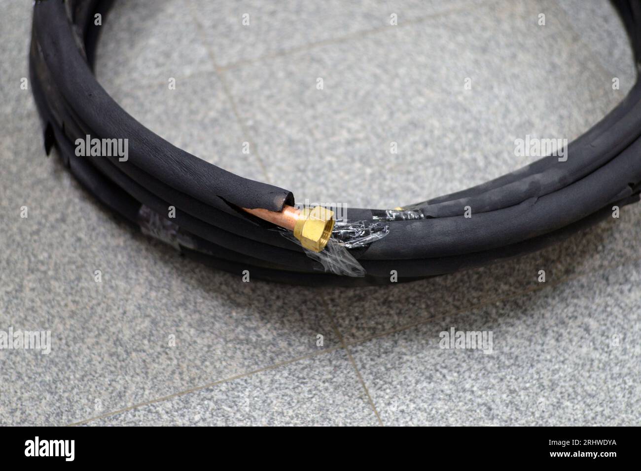 Air conditioning copper pipes tubes covered with black rubber, copper