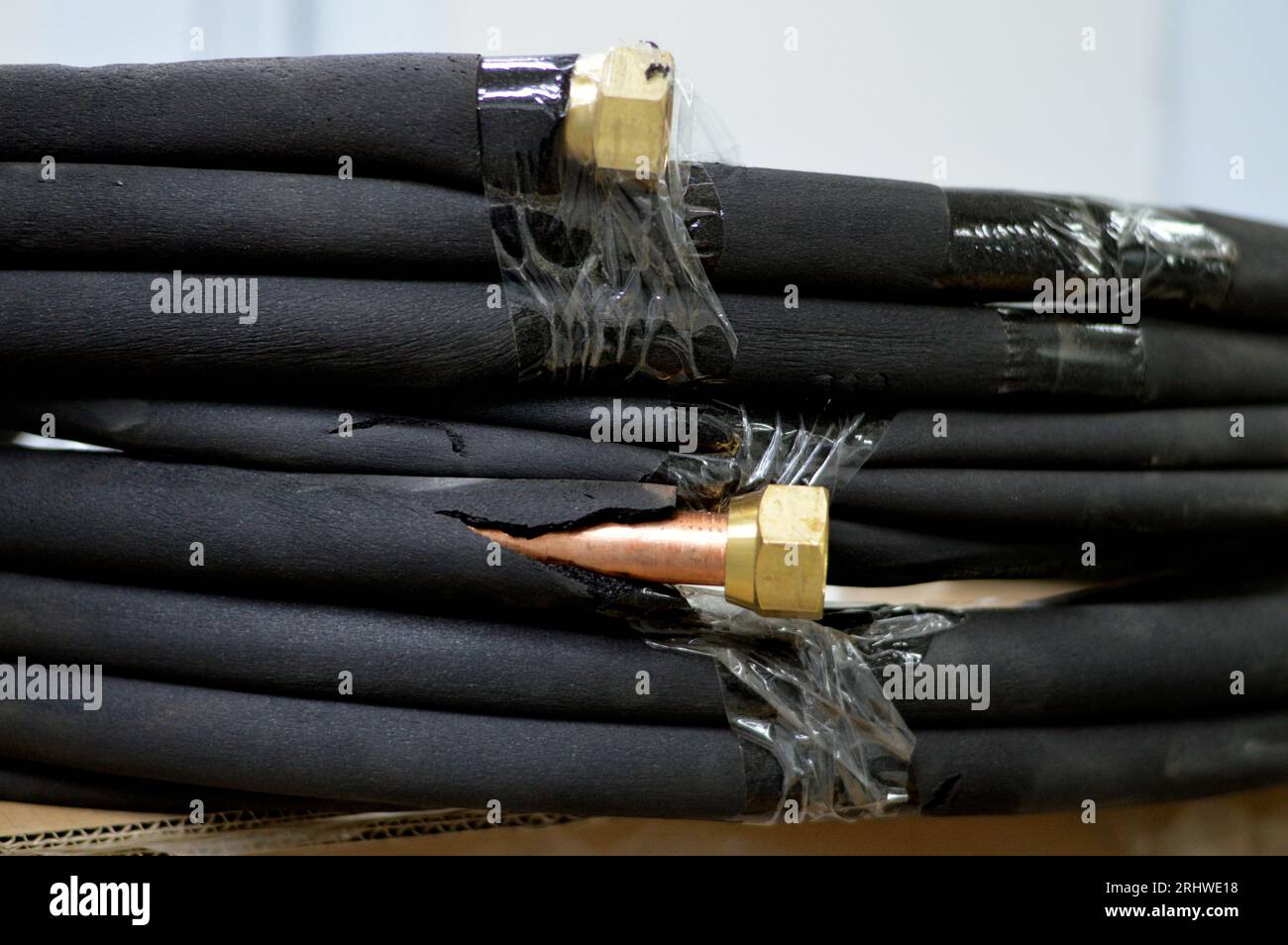 Air conditioning copper pipes tubes covered with black rubber, copper
