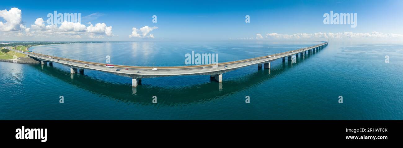 aerial panorama view of the Great Belt Bridge in Denmark.  It connects the islands of Funen and Sealand across the Great Belt. Stock Photo
